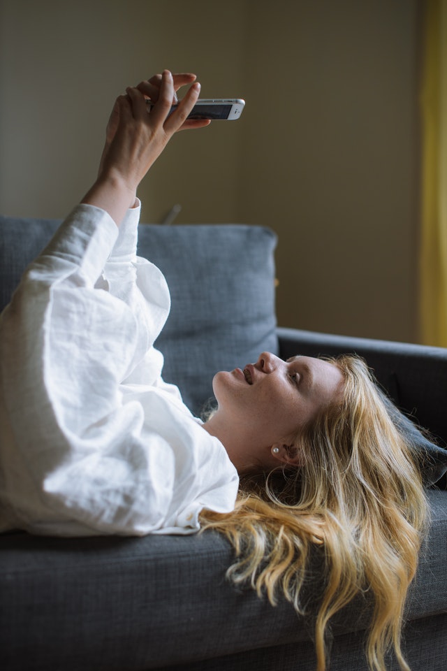 Lounge on your couch while Facetime chatting with your virtual date on your phone