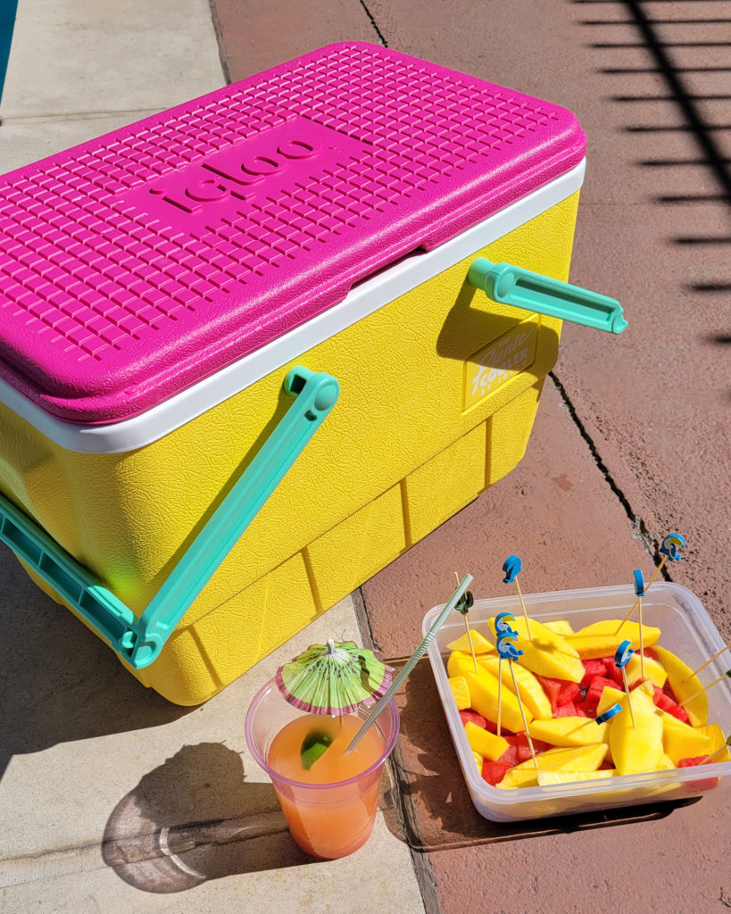 This retro style cooler from Igloo gives your pool party a pop of color, with pool party decoration tooth picks for fruit.